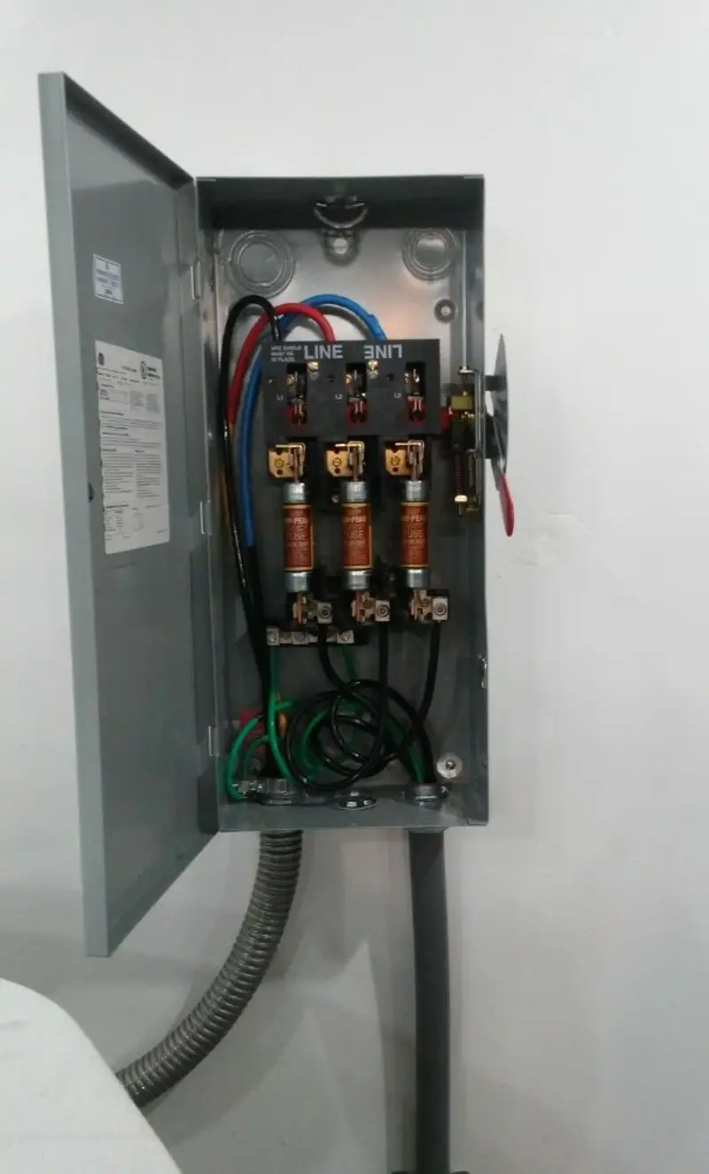Three-phase disconnect switch installed for Smoke Detector Installation in Holbrook