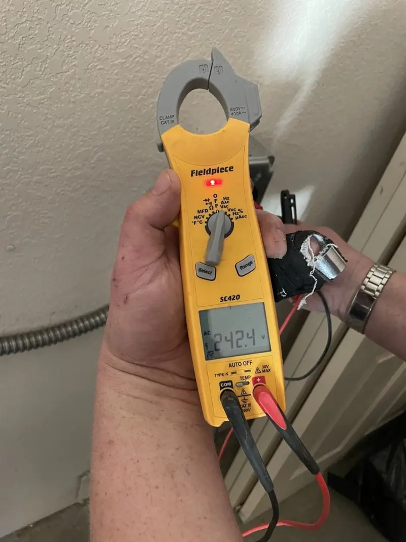 Voltage testing with clamp meter during Generator Installation in Holbrook